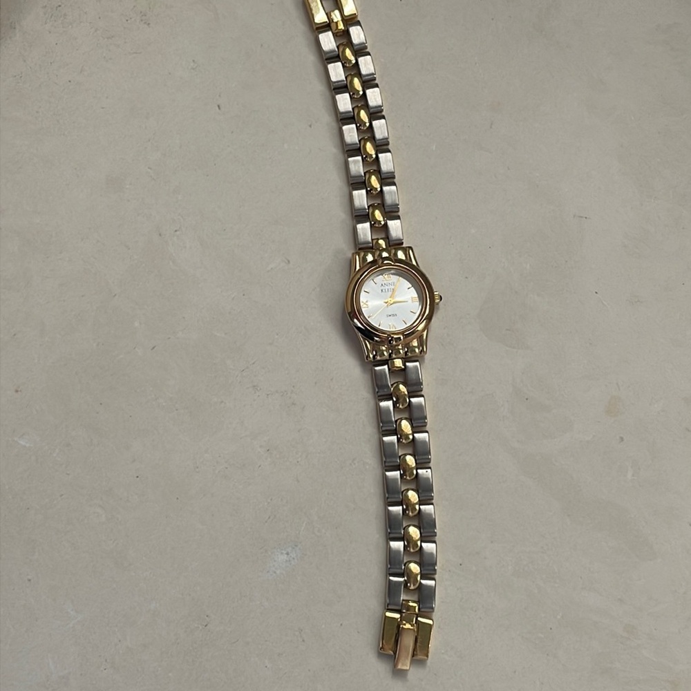 Anne Klein designer watch with 9 interchangeable face plates.